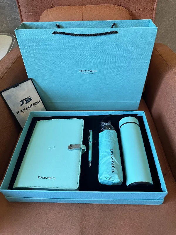 Tiffany & Co. elegant gift set - notebook, pen, umbrella, and thermos