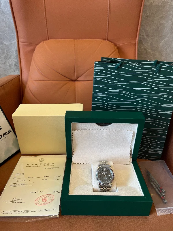 Rolex Datejust fluted bezel green dial jubilee bracelet
