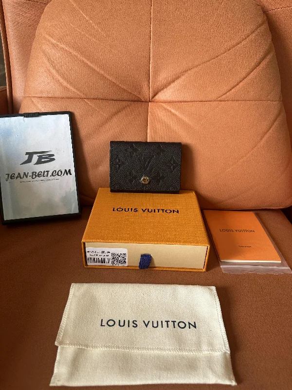 Louis Vuitton monogram empreinte leather compact wallet - M80604