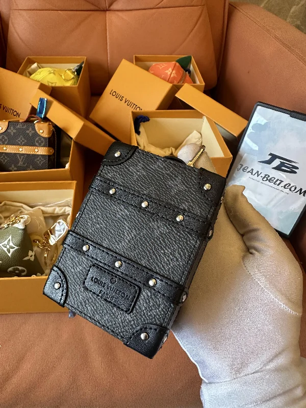 Louis Vuitton monogram black leather key pouch with rivet details
