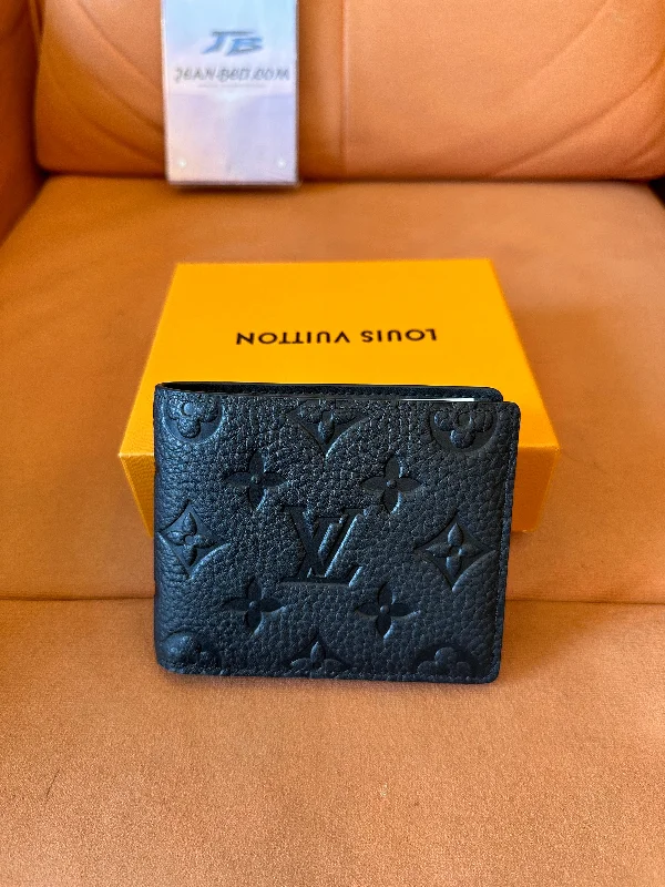 Louis Vuitton monogram empreinte leather bifold wallet