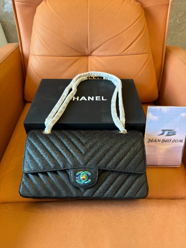 Chanel classic small black chevron caviar flap bag